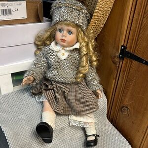 Brown and Cream Porcelain Doll with Accessories